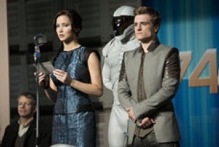 Jennifer Lawrence as Katniss and Josh Hutcherson as Peeta