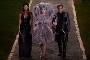 Jennifer Lawrence as Katniss, Elizabeth Banks as Effie and Josh Hutcherson as Peeta
