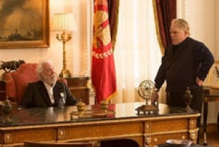 Donald Sutherland as President Snow and Philip Seymour Hoffman as Plutarch