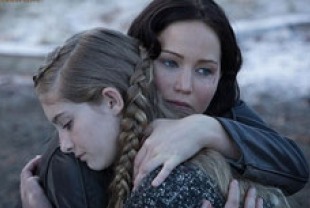 Jennifer Lawrence as Katniss and Willow Shields as Prim