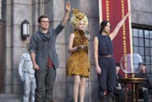 Josh Hutcherson as Peeta, Elizabeth Banks as Effie and Jennifer Lawrence as Katniss