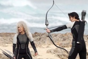 Lynn Cohen as Mags and Jennifer Lawrence as Katniss