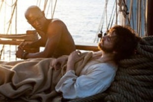 David Gyasi as the slave and Jim Sturgess as Adam
