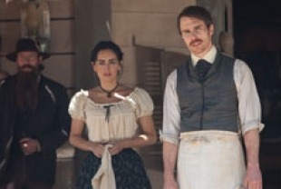 Sam Rockwell as Doc and Ana de la Reguera as Maria