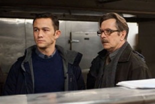 Joseph Gordon-Levitt as John Blake and Gary Oldman as Commissioner Gordon