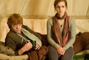 Rupert Grint as Ron and Emma Watson as Hermione