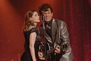 Jenna Fischer as Darlene and John C. Reilly as Dewey