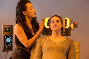 Maggie Q as Tori and Shailene Woodley as Tris