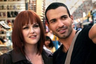 Sara Rue as Deb and Haaz Sleiman as Cookie