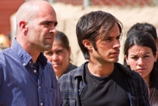 Luis Tosar as Costa and Gael Garcia Bernal as Sebastian