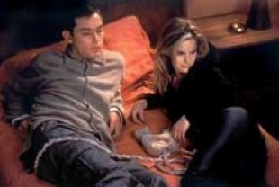 Jude Law as Ted and Jennifer Jason Leigh as Allegra