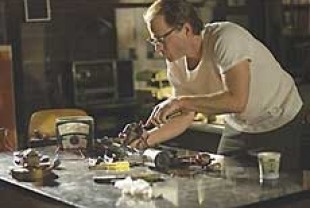 Greg Kinnear as Robert Kearns