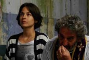 Lisa E. Favero as Rita and Ricardo Merkin as the priest