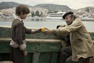 Robbie Kay as Jakob and Rade Sherbedgia as Athos