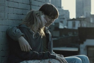 Isild Le Besco as April and Paul Dano as Lucas