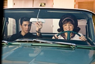 Nikki Blonsky as Tracy and Zac Efron as Link