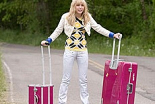 Miley Cyrus as Hannah Montana
