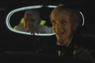 Denis Lavant as Oscar and Edith Scob as Celine