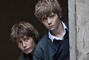 Markus Rygaard as Elias and William Johnk Nielson as Christian