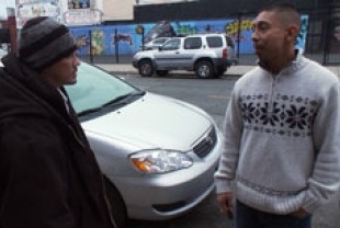 Violence interrupter Eddie Bocanegra (right)