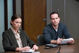 Charlize Theron as Sanders and Jason Patric as Lt. Kirklander