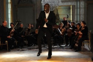 Omar Sy as Driss