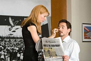 Gwyneth Paltrow as Pepper Potts and Robert Downey Jr. as Tony Stark