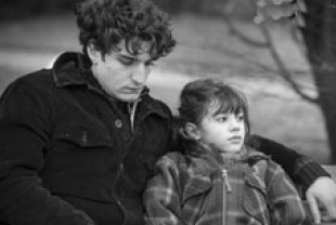 Louis Garrel as Louis and Olga Milshtein as Charlotte