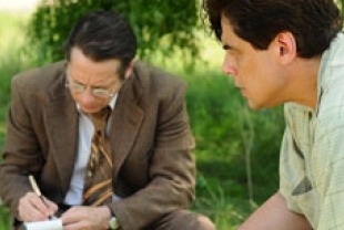 Mathieu Amalric as Georges and Benicio Del Tor as Jimmy