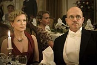 Dagmar Manzel as Dora Rabe and Ulrich Tukur as John Rabe