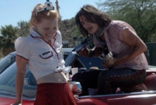 Jessica Chastain as Jolene with tattoo artist
