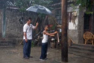 Jackie Chan as Mr. Han and Jaden Smith as Tre