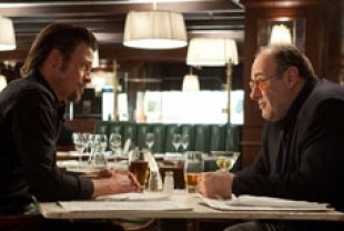Brad Pitt as Jackie Cogan and James Gandolfini as Mickey