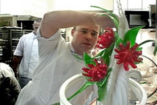 Chef Regis Lazard works on a trial sugar sculpture