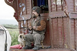 Peter Dinklage as Rowlie with Toots