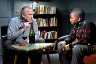 Andre Wilms as Marcel and Blondin Miguel as Idrissa