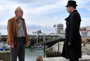 Andre Wilms as Marcel and Jean-Pierre Darroussin as Monet