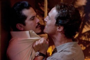 John Leguizamo as Val Valenzuela and Matthew McConaughey as Mick Haller