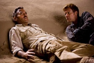 George Clooney as Lyn Cassady and Ewan McGregor as Bob Wilton