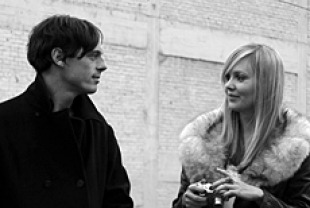 Scott McNairy as Wilson and Sara Simmonds as Vivian