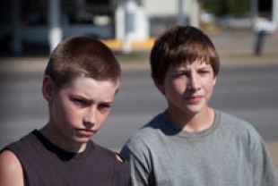 Jacob Lofland as Neckbone and Tye Sheridan as Ellis