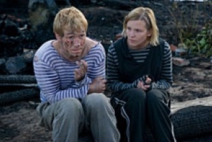 Aleksei Kravchenko as Fedor Mukhin and Alexandra Tyuftey as Vera Mukhina