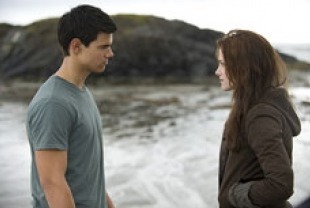 Taylor Lautner as Jacob Black and Kristen Stewart as Bella Swan