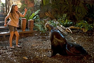 Abigail Breslin as Nim with Selie the Sea Lion