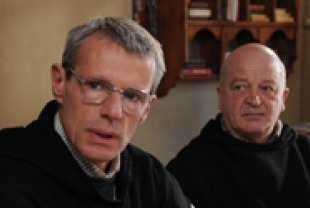 Lambert Wilson as Christian and Jean-Marie Frin as Paul