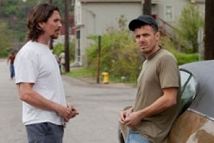 Christian Bale as Russell and Casey Affleck as Rodney