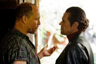 Woody Harrelson as Harlan and Willem Dafoe as Petty