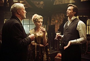 Michael Caine as Cutter, Scarlett Johansson as Olivia, and Hugh Jackman as Angier, itle
