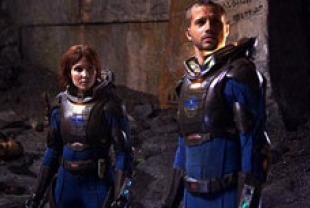 Noomi Rapace as Elizabeth and Logan Marshall-Green as Charlie