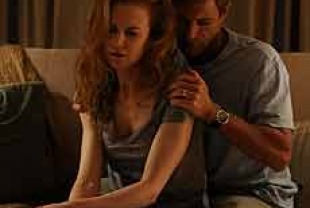 Nicole Kidman as Becca and Aaron Eckhart as Howie